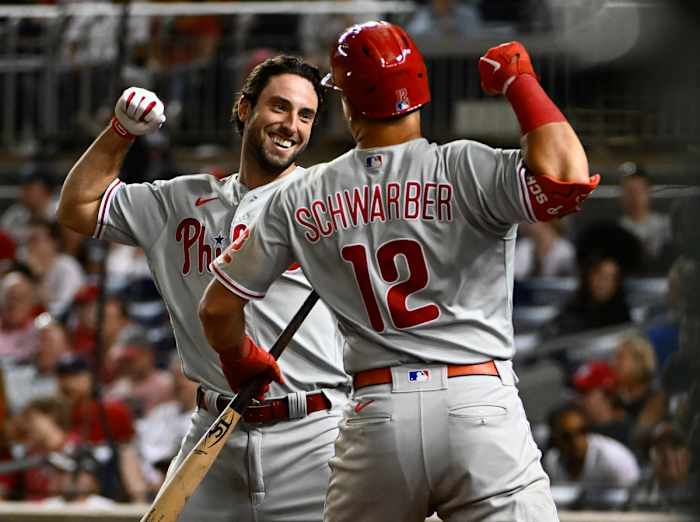 Kyle Schwarber and Matt Vierling celebrate after Vierling hit a home run against the Washington Nationals.
